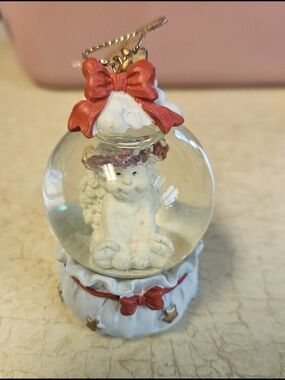 AND White Angel Globe Ornament with Red Bows